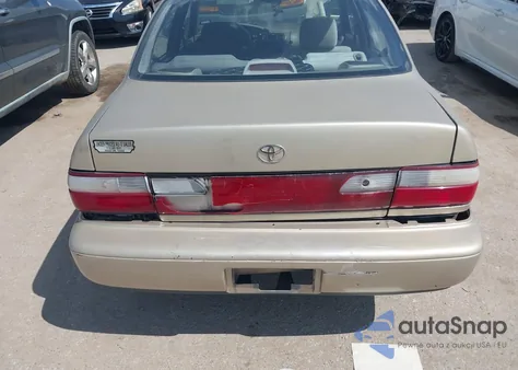 1996 Toyota Corolla Dx z USA, uszkodzony, nr VIN 1NXBB02E5TZ357940